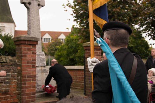 John Brand Laying Wreath