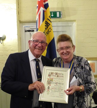 Harold receiving his award from Anny Reid